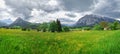 Summer austrian landscape with Grimming mountain 2.351 m, an isolated peak in the Dachstein Mountains, view from small alpine Royalty Free Stock Photo