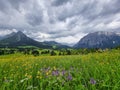 Summer austrian landscape with Grimming mountain 2.351 m, an isolated peak in the Dachstein Mountains, view from small alpine Royalty Free Stock Photo