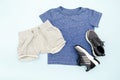 Summer babies blue clothes and accessories with t shirt, shorts,sneakers. Modern fashion kids casual outfit.Set of children`s Royalty Free Stock Photo