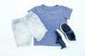 Summer babies blue clothes and accessories with t shirt, shorts,sneakers. Modern fashion kids casual outfit.Set of Royalty Free Stock Photo
