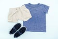 Summer babies blue clothes and accessories with t shirt, shorts,sneakers. Modern fashion kids casual outfit.Set of Royalty Free Stock Photo