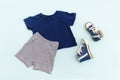 Summer babies blue clothes and accessories with t shirt, shorts,sneakers. Modern fashion kids outfit.Set of children`s clothing Royalty Free Stock Photo