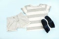 Summer babies gray clothes and accessories with t shirt, shorts,sneakers. Modern fashion kids casual outfit.Set of Royalty Free Stock Photo
