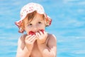 Summer baby girl eating watermelon Royalty Free Stock Photo