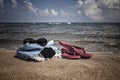 Summer background with flipflops and sunglasses on beach Royalty Free Stock Photo