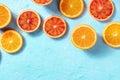 Summer background with fresh oranges on a blue background