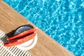 Summer background with fresh water melon near swimming pool. Hot summer travel, vacation and holiday concept. Top view Royalty Free Stock Photo