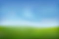 Summer background. Green fresh grass, blue sunny sky blur design. Abstract summer, spring nature. Beauty garden, park Royalty Free Stock Photo