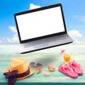 Summer background with necessities and laptop