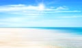 Summer background with ocean, coastline, blue sky, sunshine and beach.