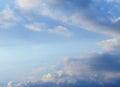 Summer background with white flying clouds on blue sky. Romantic natural heaven backdrop.