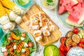 Summer bbq party concept - grilled chicken, vegetables, corn, salad, top view Royalty Free Stock Photo