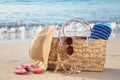 Summer beach bag on sandy beach Royalty Free Stock Photo