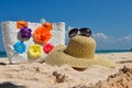 Summer beach bag with straw hat and sunglasses Royalty Free Stock Photo