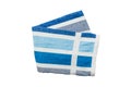 Summer beach blue stripes towel isolated top view .Folded nautical print cloth
