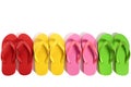 Summer beach flip flops row isolated on white background.