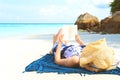 Summer Beach Holiday Woman reading a book on the beach in free time Royalty Free Stock Photo