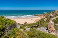 Summer beach nature background with wooden path to sandy beach Royalty Free Stock Photo