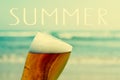 Summer on the beach with a refreshing beer