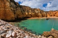 Summer beach scene at Algarve coast Pinhao beach, Lagos, Portugal