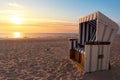 Summer beach at sunset. Empty beach chair on North Sea shore, on Sylt island Royalty Free Stock Photo