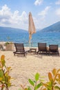 Summer beach vacation. Beautiful Mediterranean landscape on sunny day. Montenegro, Bay of Kotor near Tivat city Royalty Free Stock Photo