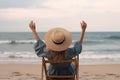 Summer beach vacation concept. Back view of woman in sun hat with rised hands on sunbed, neural network generated art Royalty Free Stock Photo