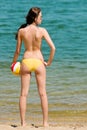 Summer beach woman enjoy sun hold ball Royalty Free Stock Photo