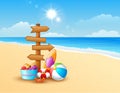 Summer beach with wooden arrow