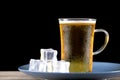 Summer beer and ice on plate Royalty Free Stock Photo