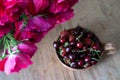 Summer berries in a ceramic jar on a wooden table Royalty Free Stock Photo