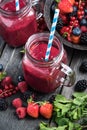 Summer berries smoothie in mason jar Royalty Free Stock Photo