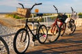 Summer bikes are parked on the boardwalk