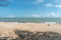 Summer blue ocean sea landscape seascape with turquoise wave, white sandy beach and blue cloudy sky at Desaru Coast, Malaysia Royalty Free Stock Photo