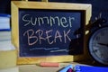 Summer break on phrase colorful handwritten on blackboard Royalty Free Stock Photo