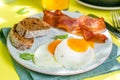 Summer breakfast - eggs, bacon, pancakes, cereal Royalty Free Stock Photo