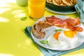 Summer breakfast - eggs, bacon, pancakes, cereal Royalty Free Stock Photo