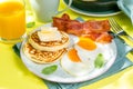 Summer breakfast - eggs, bacon, pancakes, cereal Royalty Free Stock Photo