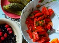 Summer Breakfast. Vegetable salad, low-salted cucumbers and berries.Table setting