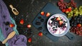 Summer breakfast with yoghurt and berries creative flatlay top view