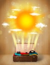 Summer bright sun with clouds and tourist bag Royalty Free Stock Photo
