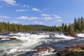 Summer brilliance at the Namsen River in Namsskogan, Trondelag, Norway, with cascading waters