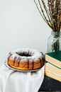 Summer Bundt Cake with Topped with Sugar Glaze, close up. Countr