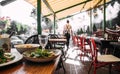 Summer cafe terrace table served with dishes Royalty Free Stock Photo