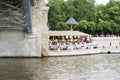 Summer cafes on the embankment of the Moscow river under the bridge.