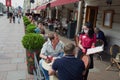 Summer cafes and restaurants have opened in the city center after the Covid-19 pandemic. People on the terrace, veranda, summer