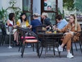 Summer cafes and restaurants have opened in the city center after the Covid-19 pandemic. People on the terrace, veranda, summer