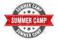 Summer camp round stamp with ribbon. label sign Royalty Free Stock Photo