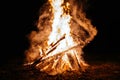 Summer campfire flame at night in nature Royalty Free Stock Photo