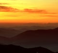 Morning mountains scenery, stunning summer dawn landscape, hills mountains covered forest at sunlight and dramatic sky, amazing p